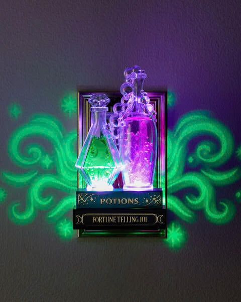 Potion on books projector nighlight wallflower fragance plug