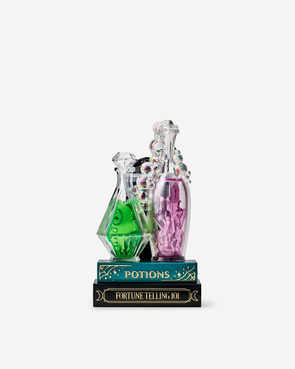 Potion on books projector nighlight wallflower fragance plug